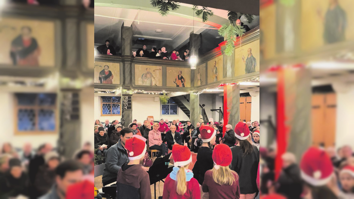 Adventsmarkt in und vor der Laurentiuskirche in Bieber mit Musik und Leckereien